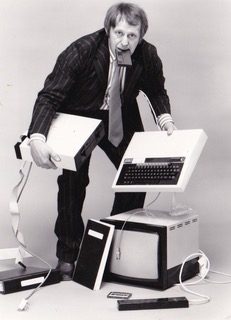 Len holding computer etc for trolley promotion
