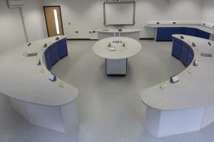 School lab furniture with curved Velstone worktop and blue doors