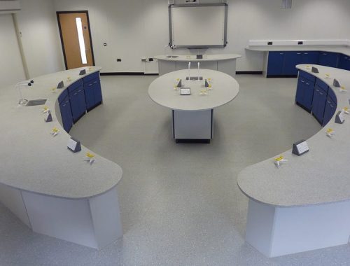 School lab furniture with curved Velstone worktop and blue doors