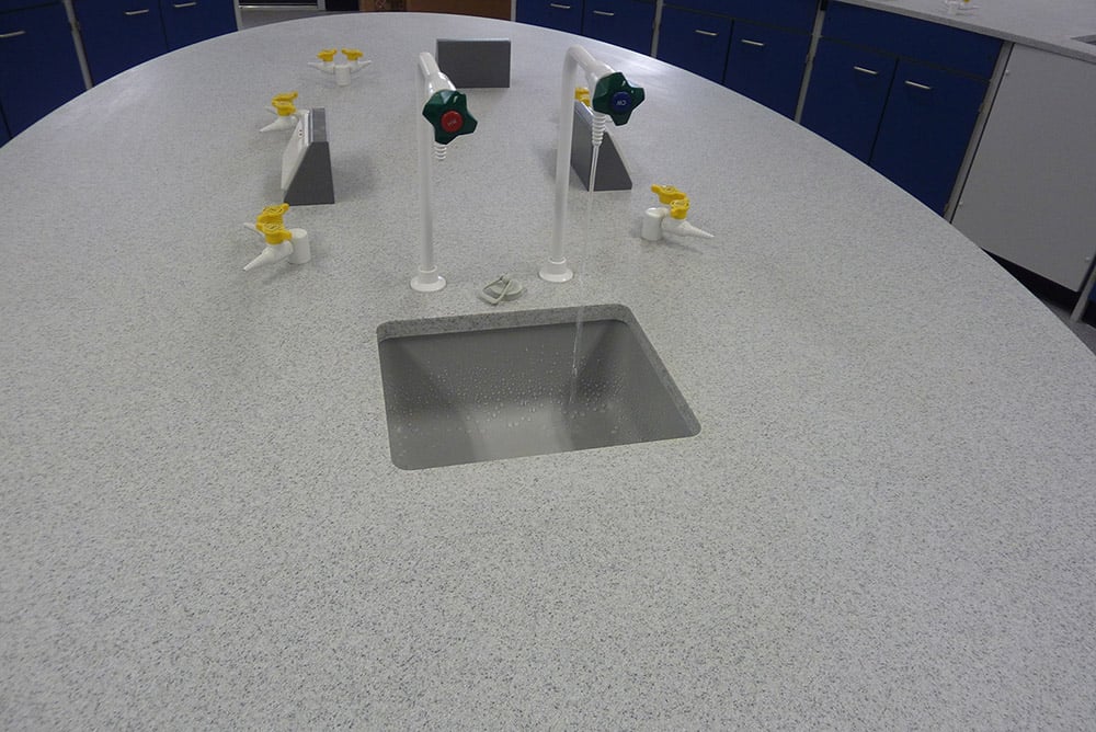 School science lab furniture curved Velstone worktop and blue doors