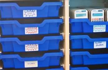 Blue single Gratnells’ Trays with labels.
