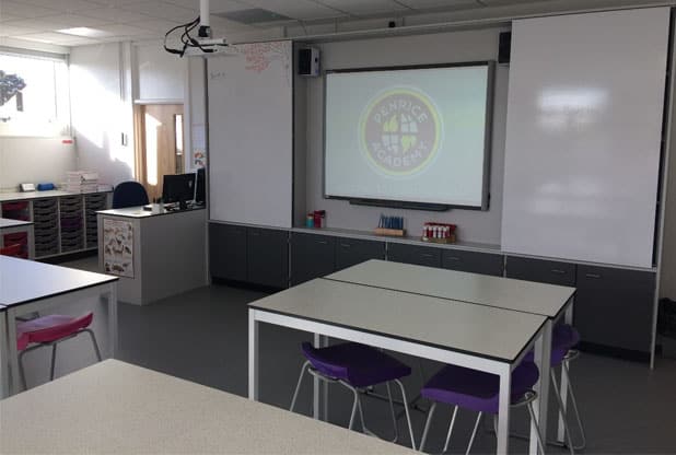 Penrice Academy classroom with teaching wall featuring whiteboards and interactive whiteboard