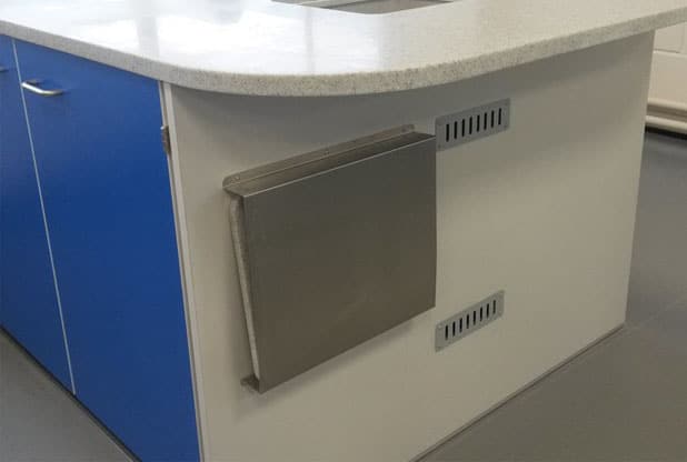 Crosfields School laboratory sink lid storage.