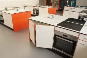 The Lakes School food tech room with cooker and worktops.