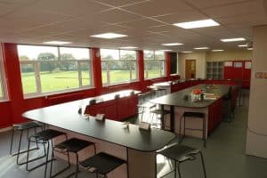 Harris Church of England Academy food technology classroom with red contrast wall.