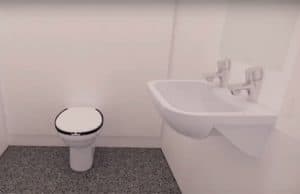 3D of a school washroom cubicle with toilet and sink.