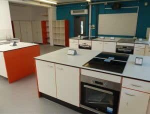 The Lakes School food tech classroom with teacher's demonstration bench
