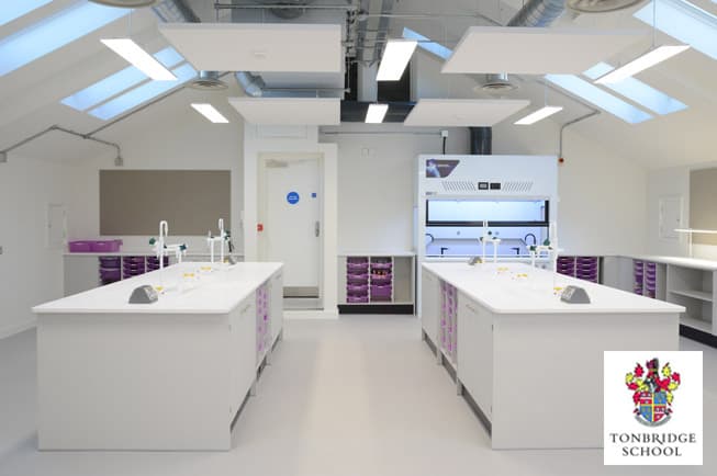 Tonbridge School science laboratory furniture with fume cupboard and purple storage trays