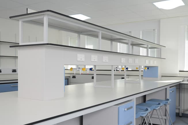 Laboratory furniture with reagent shelving for a clutter free work space