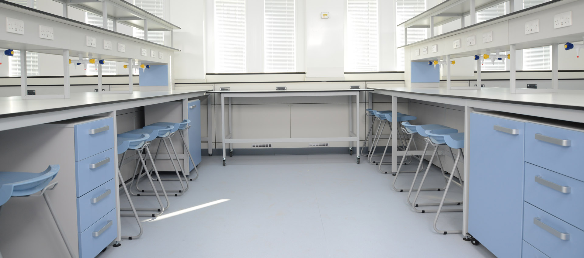 kent-university-laboratory-furniture-with-mobile-storage-units-and-blue-stools-by-klick-laboratories