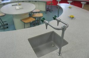 Feature satin chrome taps for school laboratory furniture fit out