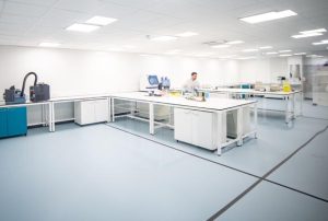 klick laboratory installation for biotech company showing scientist working