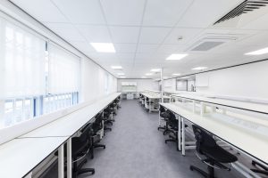 lab tables with single reagent shelf installed by klick laboratory furniture supplier