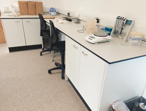 fixed lab benching and storage cupboards