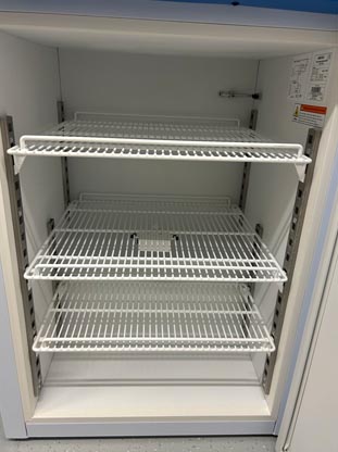 wireless temperature sensor attached to middle freezer shelf