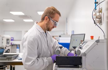 AFC scientist using refurbished lab